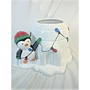 Igloo planter penguin decorating igloo With Christmas lights Very Cute Teleflora